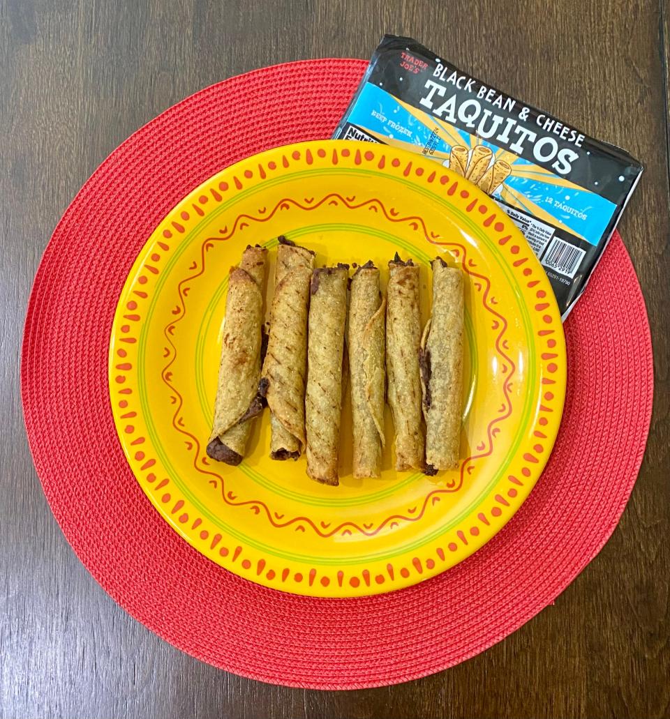 Trader Joe's Black Bean & Cheese Taquitos on yellow Mexican plate.