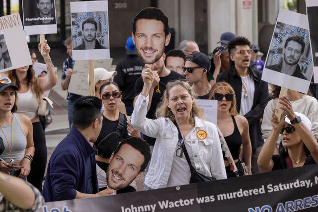 <p>Sipa via AP</p> Johnny Wactor's friends, family and supporters march through Los Angeles