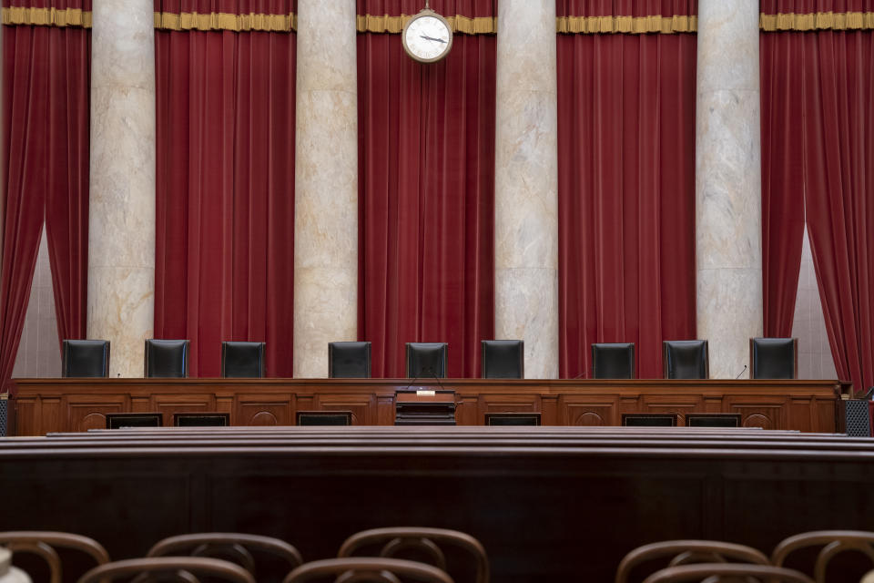 FILE - In this June 2019 file photo the empty courtroom is seen at the U.S. Supreme Court in Washington as the justices prepare final decisions of the high court's term. The Senate is ready to move quickly on a Supreme Court nominee. President Donald Trump is expected Saturday, Sept. 26, 2020, to announce his replacement for the late Justice Ruth Bader Ginsburg. (AP Photo/J. Scott Applewhite, File)