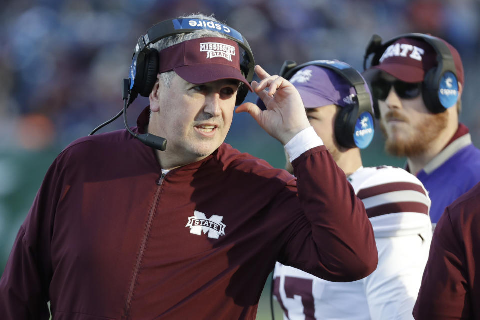 FILE - In this Dec. 30, 2019, file photo, Mississippi State head coach Joe Moorhead watches from the sideline in the first half of the Music City Bowl NCAA college football game against Louisville, in Nashville, Tenn. From new Akron coach Joe Moorhead to Central Michigan's Lew Nichols' pursuit of 2,000 yards, there are plenty of intriguing storylines around the league. (AP Photo/Mark Humphrey, File)