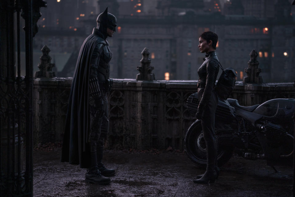 This image released by Warner Bros. Pictures shows Robert Pattinson, left, and Zoe Kravitz in a scene from "The Batman." (Jonathan Olley/Warner Bros. Pictures via AP)