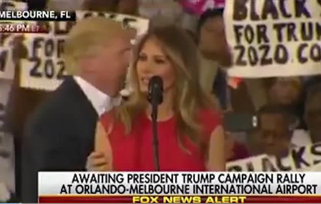 Melania Trump appeared to flinch as her husband touched her arm onstage at a Rally in Florida. Photo: Fox News