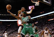 Rajon Rondo #9 of the Boston Celtics goes up for a shot over his head against Dwyane Wade #3 of the Miami Heat in the second quarter in Game Seven of the Eastern Conference Finals in the 2012 NBA Playoffs on June 9, 2012 at American Airlines Arena in Miami, Florida. (Photo by Mike Ehrmann/Getty Images)