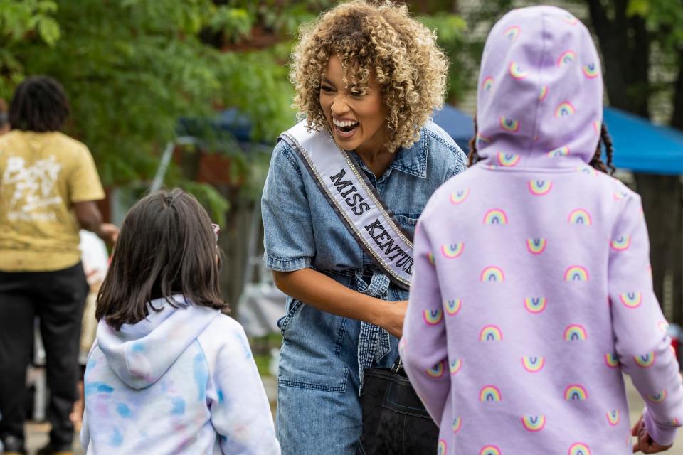 WHAS11 multimedia journalist and newly crowned Miss Kentucky, Elle Smith, chats with children at the "To Love All Serve All in Unity" positive hip-hop festival event at Chef Space on Saturday. May 29, 2021