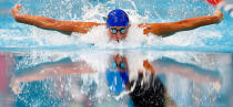 Ryan Lochte competes in the first semifinal heat of the Men's 100 m Butterfly during Day Six of the 2012 U.S. Olympic Swimming Team Trials at CenturyLink Center on June 30, 2012 in Omaha, Nebraska. (Photo by Jamie Squire/Getty Images)