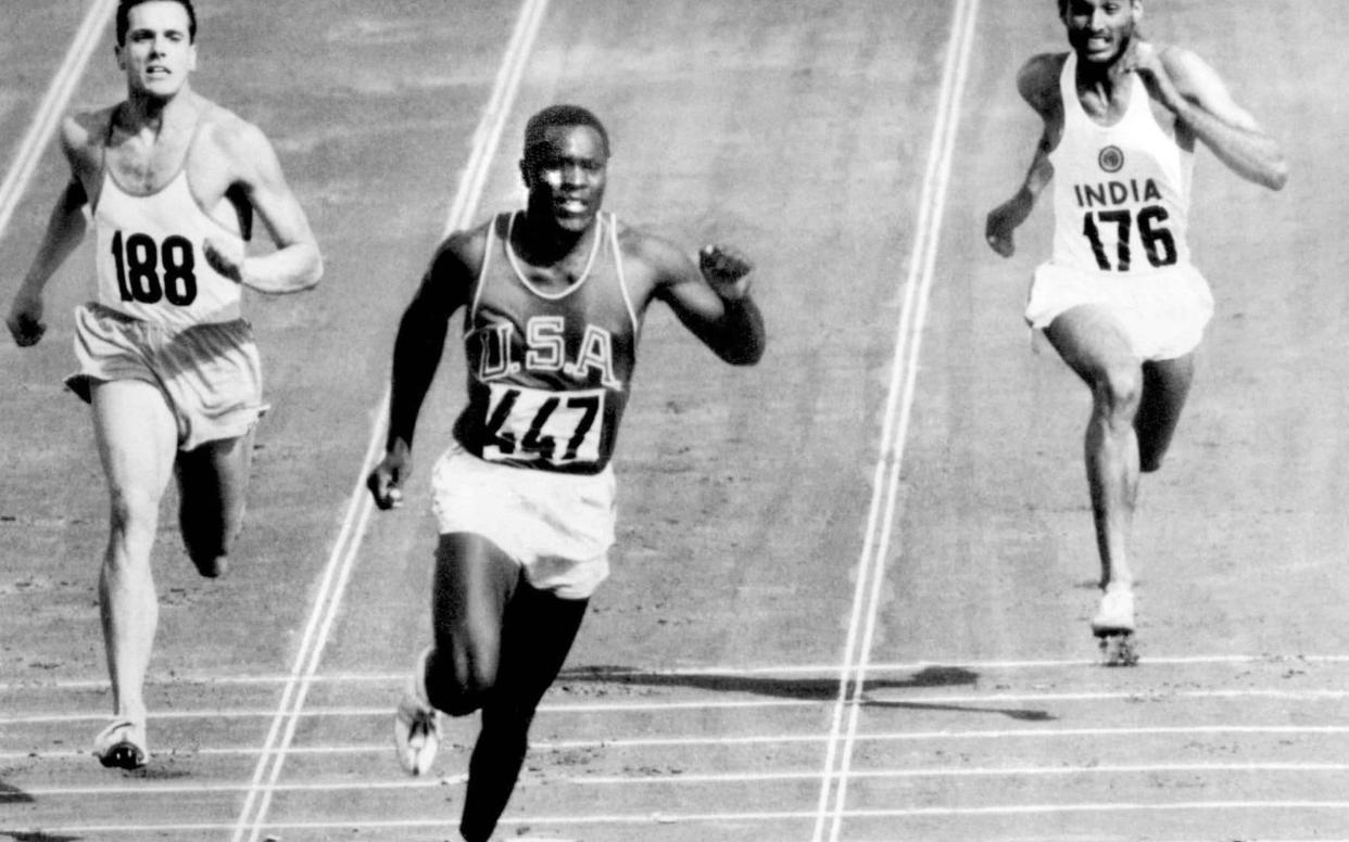 Rafer Johnson winning the fourth heat of the decathlon 100 metres at the Rome Olympics in 1960 -  AP/OLYMPIC POOL PHOTO