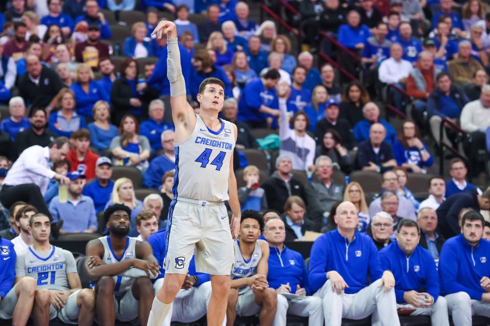 Dec 14, 2021; Omaha, Nebraska, USA;  Creighton Bluejays forward Ryan Hawkins (44) connects on a three point basket against the Arizona State Sun Devils in the second half at CHI Health Center Omaha.