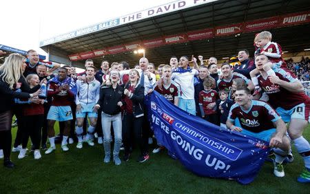 Britain Football Soccer - Burnley v Queens Park Rangers - Sky Bet Football League Championship - Turf Moor - 2/5/16. Burnley manager Sean Dyche celebrates promotion to the premier league with their players and fans. Mandatory Credit: Action Images / Carl Recine