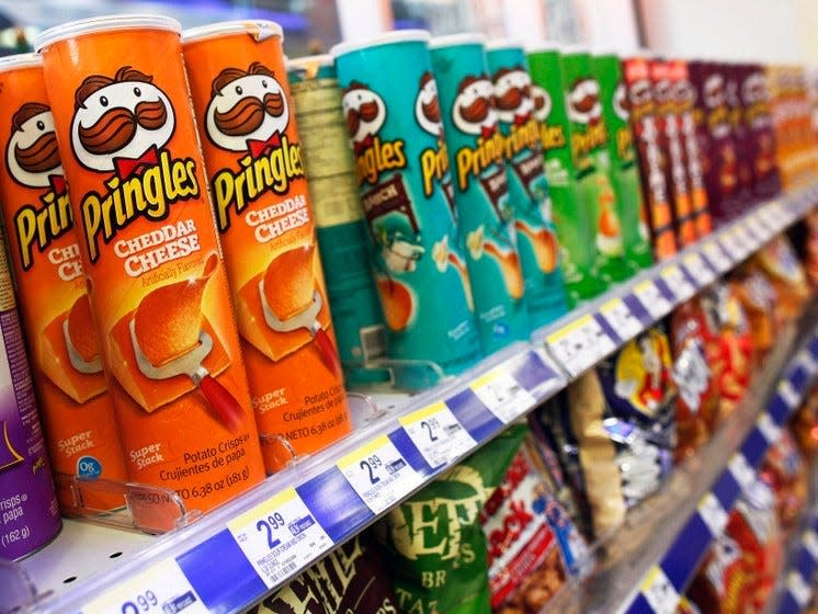 Cans of Pringles are seen on display in New York April 5, 2011. REUTERS/Shannon Stapleton 