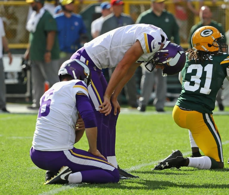 Minnesota Vikings kicker Daniel Carlson reacts to missing a potential game-winning field goal against the Green Bay Packers. He was released by the club a day later