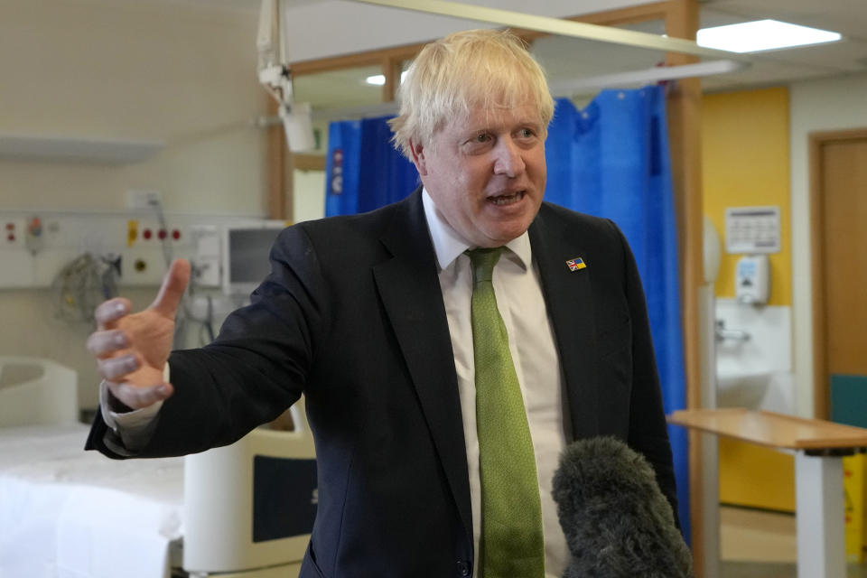 EPSOM, ENGLAND - AUGUST 26: Britain's Prime Minister Boris Johnson speaks to the media during a visit to South West London Orthopaedic Centre on August 26, 2022 in Epsom, Surrey, England. The Prime Minister's visit is to see how centre's work is contributing to busting the Covid backlogs by offering patients quicker access to treatment. (Photo by Kirsty Wigglesworth - WPA pool/Getty Images)