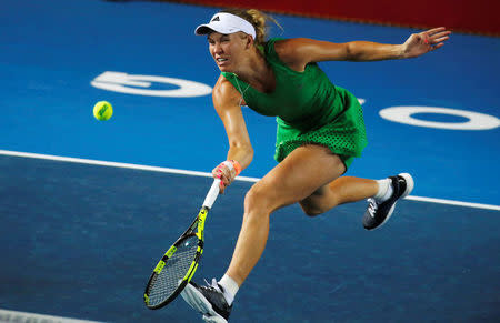 Tennis - Hong Kong Open semi-finals - Caroline Wozniacki of Denmark v Jelena Jankovic of Serbia - Hong Kong, China - 15/10/16. Wozniacki returns a shot. REUTERS/Bobby Yip