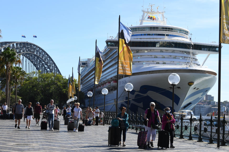 Pictured are Ruby Princess cruise passengers disembarking the ship in Circular Quay, Sydney.