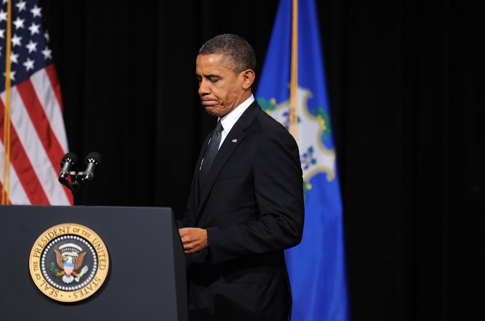 NEWTOWN, CT - DECEMBER 16: U.S. President Barack Obama walks to the podium to speak at an interfaith vigil for the shooting victims from Sandy Hook Elementary School on December 16, 2012 at Newtown High School in Newtown, Connecticut. Twenty-six people were shot dead, including twenty children, after a gunman identified as Adam Lanza opened fire at Sandy Hook Elementary School. Lanza also reportedly had committed suicide at the scene. A 28th person, believed to be Nancy Lanza, found dead in a house in town, was also believed to have been shot by Adam Lanza. (Photo by Olivier Douliery-Pool/Getty Images)