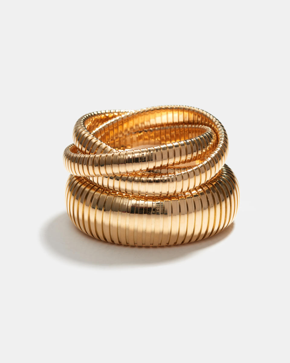 Sidney Garber yellow gold rolling bracelets. 