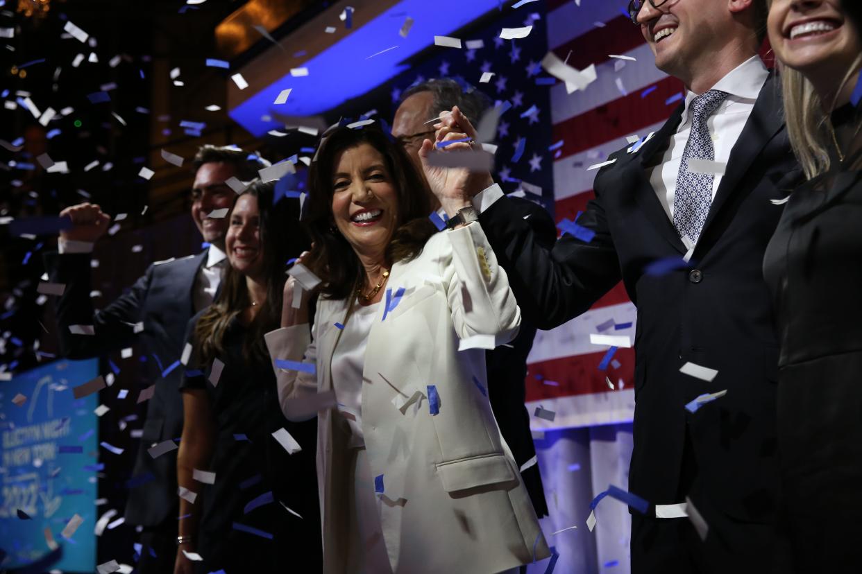 Gov. Kathy Hochul, center, celebrates her win during the primaries at Tribeca 360, Manhattan, New York, Tuesday, June 28, 2022. 