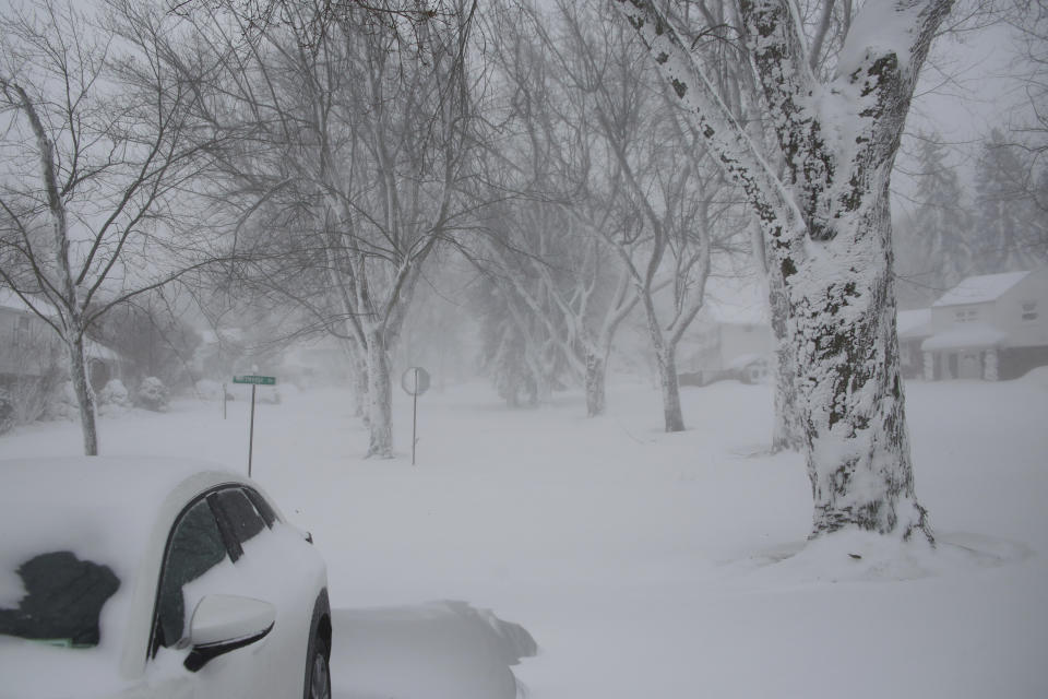 A winter storm rolls through Western New York Saturday, Dec. 24, 2022, in Amherst N.Y. A battering winter storm has knocked out power to hundreds of thousands of homes homes and businesses across the United States on Saturday. It left millions more to worry about the prospect of further outages and crippled police and fire departments. (AP Photo/Jeffrey T. Barnes)