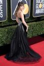 <p>Dakota Johnson wearing glittering black Gucci. </p>