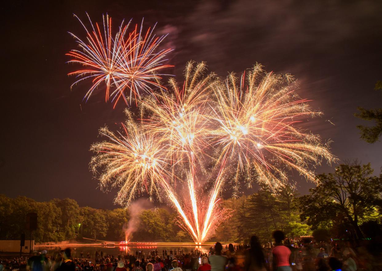 Fireworks light up the sky over the lagoon Monday, July 3, 2023 during the annual 3rd of July Fireworks Celebration at Glen Oak Park in Peoria.