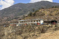 This early 2022 photo provided by Global Witness shows Border Guard Force barracks in Myanmar's northern Kachin State, near rare earth mining sites. The Border Guard Forces are part of the Myanmar military and work with local militias to control the rare earth trade inside Myanmar, along the Chinese border. (Global Witness via AP)