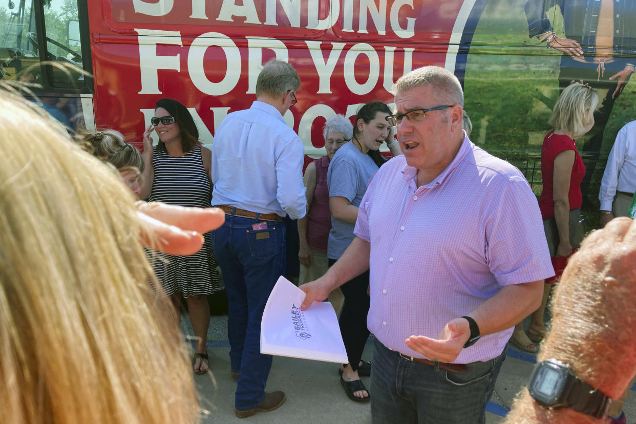 FILE - Illinois Republican gubernatorial candidate Darren Bailey speaks to voters during a campaign stop in Athens, Ill., June 14, 2022. Bailey is seeking the Republican nomination to face Democratic Gov. J.B. Pritzker in November. (AP Photo/John O'Connor, File)