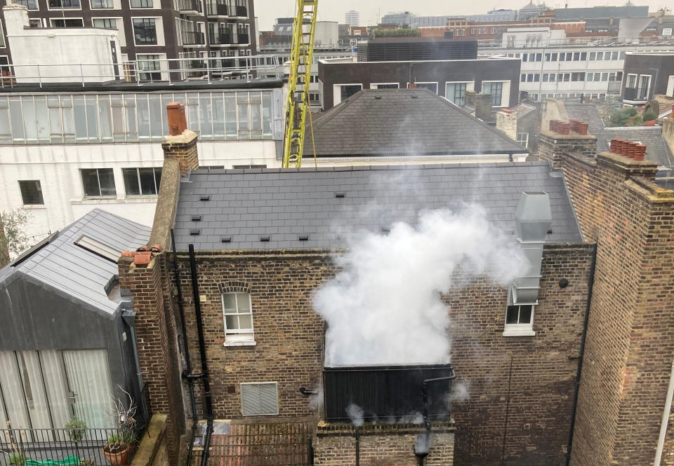 Smoke could be seen billowing from the balcony after the blaze was extinguished. (SWNS)