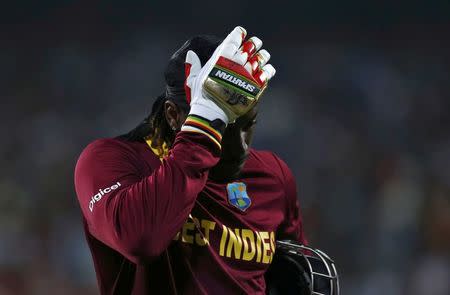 Cricket - England v West Indies - World Twenty20 cricket tournament final - Kolkata, India - 03/04/2016. West Indies Chris Gayle walks off the field after his dismissal. REUTERS/Adnan Abidi