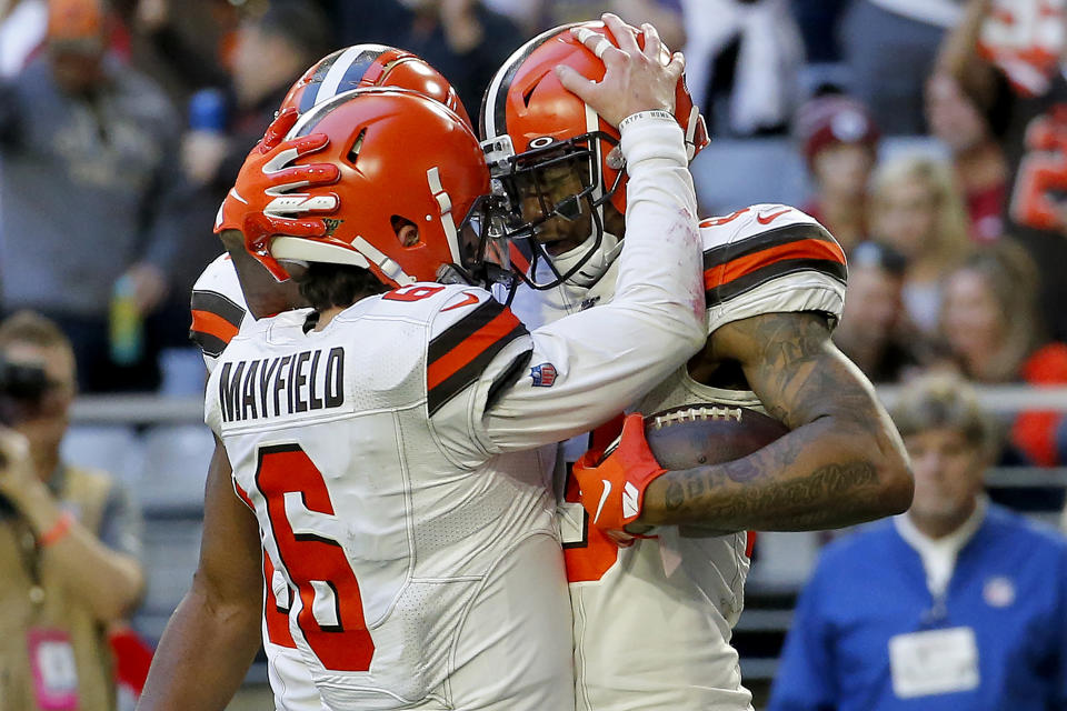 Cleveland Browns tight end Ricky Seals-Jones (83) celebrates his touchdown against the Arizona Cardinals with quarterback Baker Mayfield (6) during the second half of an NFL football game, Sunday, Dec. 15, 2019, in Glendale, Ariz. (AP Photo/Ross D. Franklin)