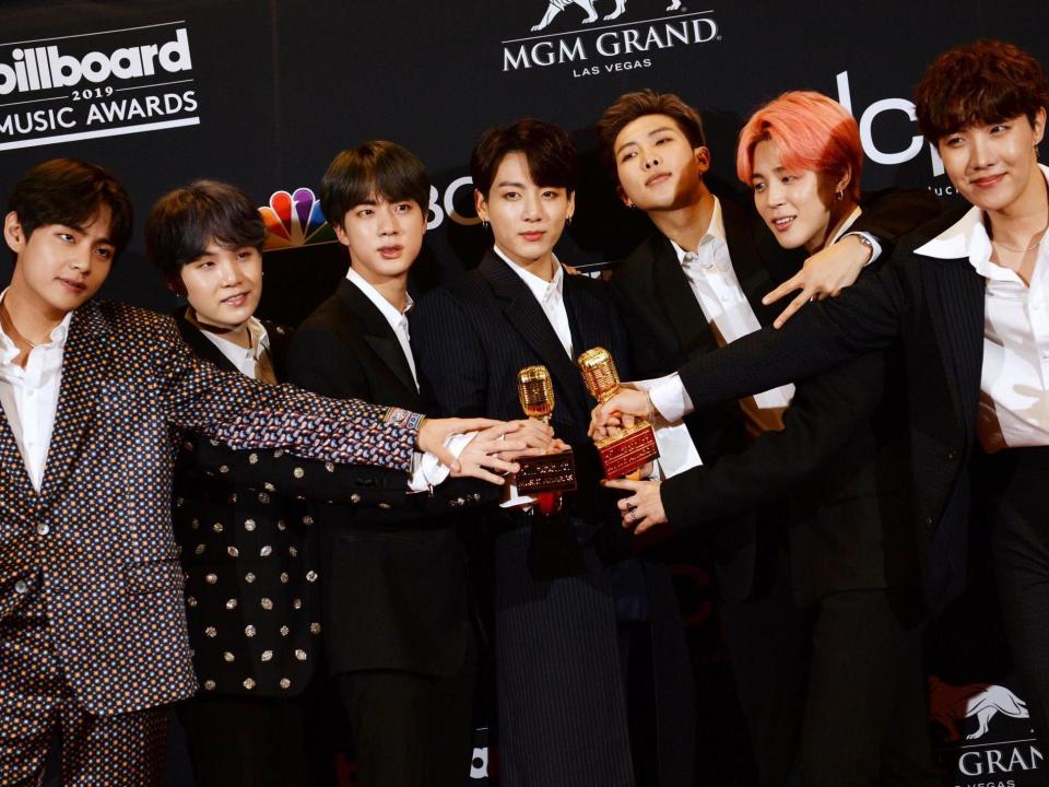 BTS pose in the press room with their awards during the 2019 Billboard Music Awards at the MGM Grand Garden Arena on 1 May, 2019, in Las Vegas, Nevada: BRIDGET BENNETT/AFP/Getty Images