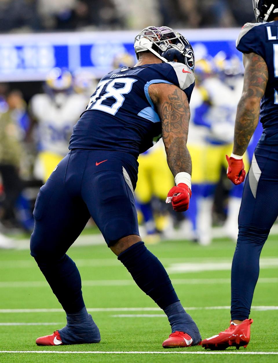 Tennessee Titans defensive tackle Jeffery Simmons (98) celebrates after sacking Los Angeles Rams quarterback Matthew Stafford (9) during the second quarter at SoFI Stadium Sunday, Nov. 7, 2021 in Inglewood, Calif. 