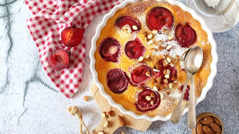 red plum clafoutis with almonds on top
