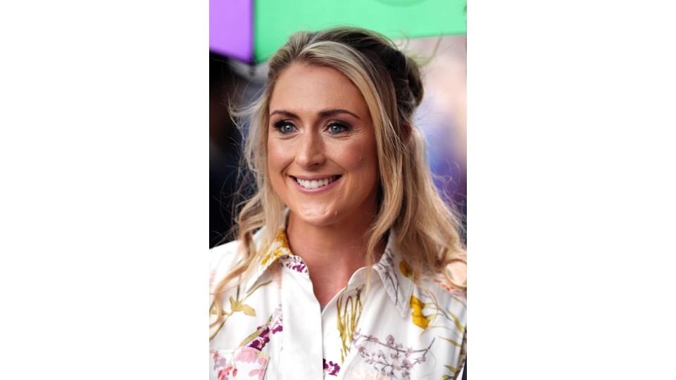 woman smiling in floral dress