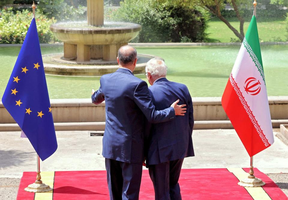 Iran Foreign Minister Hossein Amir-Abdollahian, left, welcomes Josep Borell, the European Union’s foreign affairs and security representative, in Tehran in June 2022. <a href="https://media.gettyimages.com/photos/irans-foreign-minister-hossein-amirabdollahian-welcomes-josep-borell-picture-id1241518184" rel="nofollow noopener" target="_blank" data-ylk="slk:Atta Kenare/AFP via Getty Images;elm:context_link;itc:0;sec:content-canvas" class="link ">Atta Kenare/AFP via Getty Images</a>