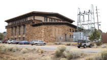 This photo taken March 13, 2014, and provided by the National Park Service shows the exterior of a building that housed equipment to supply power and heat to visitors and residents at the Grand Canyon. The building, known as the powerhouse, is in line for an upgrade that will bring it up to code and stabilize it while the park determines how best to use it. (Michael Quinn/National Park Service via AP)