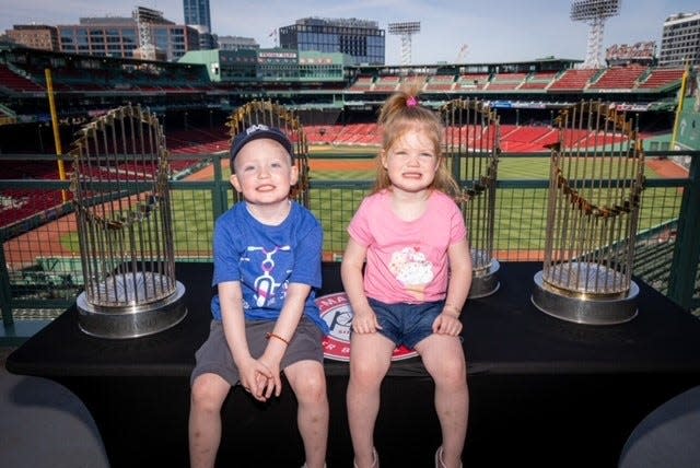 Kieran Whall with his younger sister Adeline at Fenway Park.