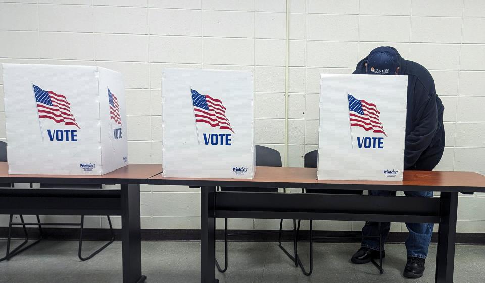 With the sun not quite over the horizon, polls have opened in Mississippi, and ballots are being cast in the Democratic and Republican primary election. Voting started off quietly at the Canton National Guard Armory as Dana Gordon of Canton, Miss., fills out his ballot as the first voter of the day on Tuesday, March 12, 3024. Polls are open from 7 a.m. to 7 p.m.