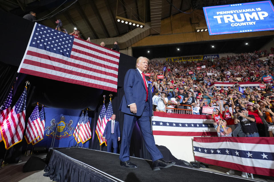 FILE - Republican presidential candidate former President Donald Trump arrives to speak at a campaign rally, July 31, 2024, in Harrisburg, Pa. Facing the need to win Pennsylvania, Vice President Kamala Harris has sworn off any prior assertion that she opposed fracking. But that hasn't stopped Trump from wielding her now-abandoned position as to win over working-class voters in the key battleground state where the industry means jobs. (AP Photo/Alex Brandon, File)