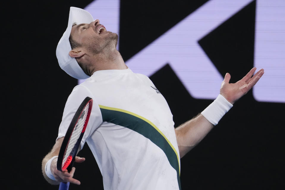 Andy Murray of Britain reacts during his second round match against Thanasi Kokkinakis of Australia at the Australian Open tennis championship in Melbourne, Australia, Friday, Jan. 20, 2023. (AP Photo/Ng Han Guan)