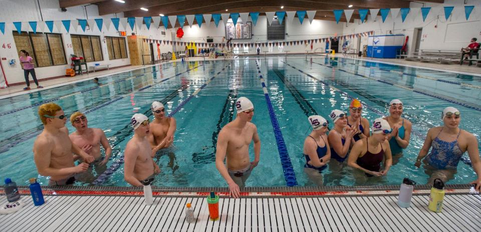 Lincoln-Sudbury Regional High School swimmer Thomas Eppich, center, and the LS swim team in the Atkinson Pool, Feb. 15, 2024.