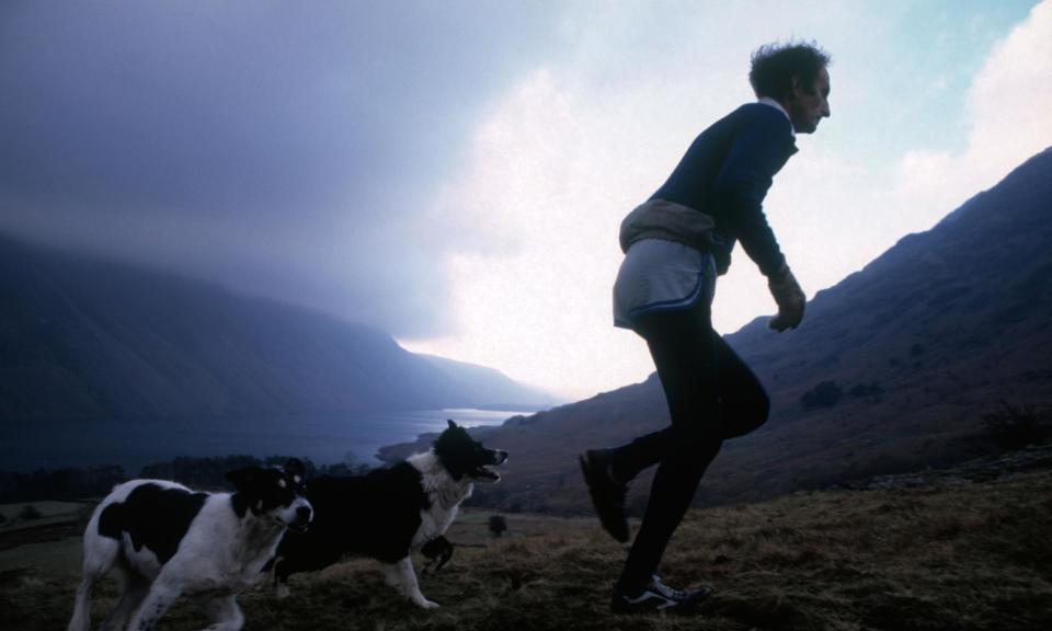 <span>Joss Naylor running in Wasdale, Cumbria, in 2004. He was born in the hamlet of Wasdale Head, where he lived for most of his life.</span><span>Photograph: John Angerson/Alamy</span>