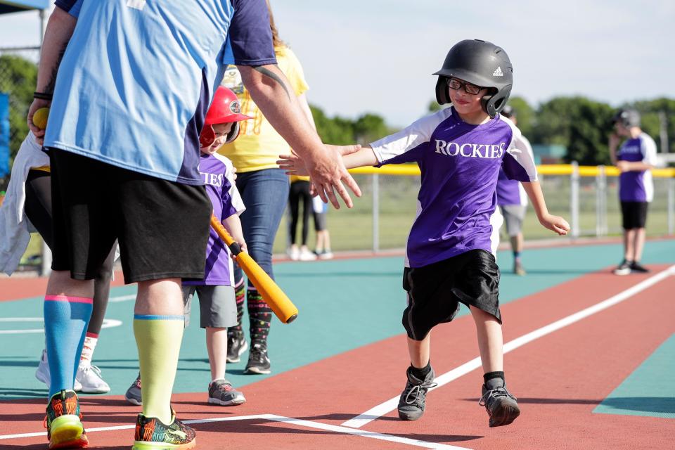 Urijah Morales makes it to home plate at Miracles Park Thursday, June 20, 2019, in Manitowoc, Wis. Joshua Clark/USA TODAY NETWORK-Wisconsin