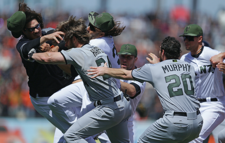 Michael Morse (left) right after his collision with teammate Jeff Samardzija. (AP Photo)