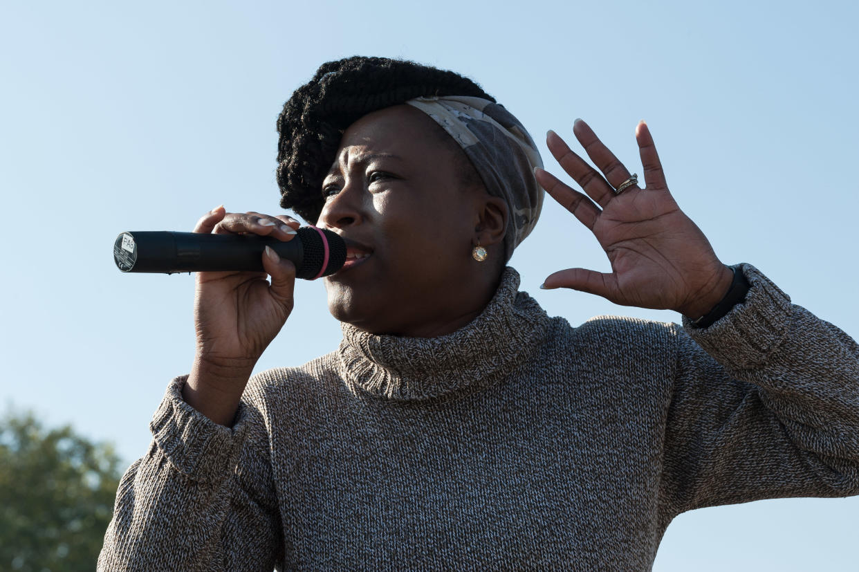 LONDON, UNITED KINGDOM - OCTOBER 10: Women's Rights Activist Dr. Shola Mos-Shogbamimu addresses a rally in Londons Hyde Park against governments implementation of pensions age equalisation policy, which increased the female state pension age from 60 to 66. Protesters call for fair transitional state pension arrangements as the current policy changes affect an estimated 3.9 million women who have to wait up to an extra six years to receive their pensions. October 10, 2018 in London, England. (Photo credit should read Wiktor Szymanowicz / Barcroft Media via Getty Images)