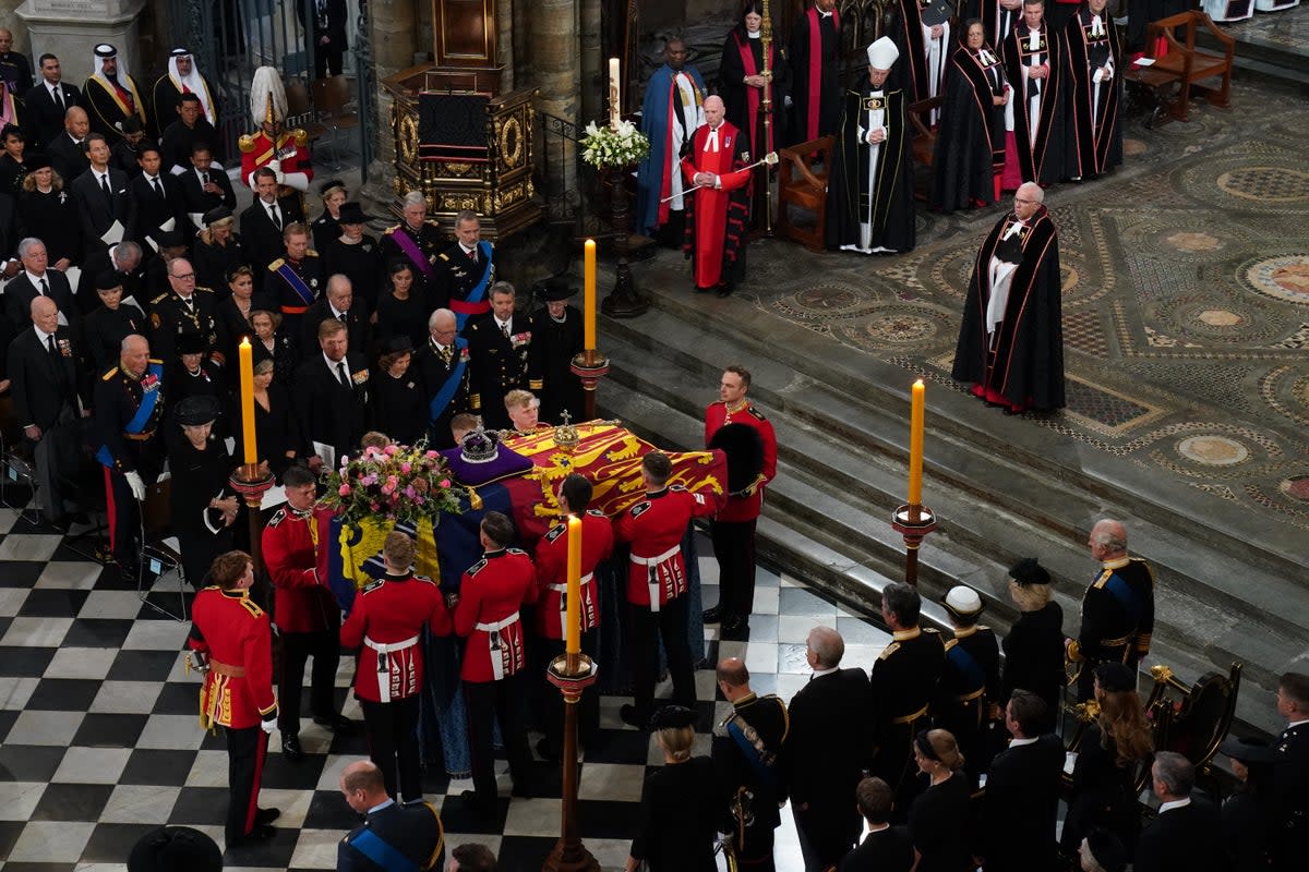 The Queen’s coffin is placed near the altar in Westminster Abbey (Gareth Fuller/PA) (PA Wire)