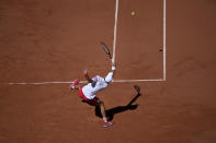 Serbia's Novak Djokovic returns the ball to Stefanos Tsitsipas of Greece during their final match of the French Open tennis tournament at the Roland Garros stadium Sunday, June 13, 2021 in Paris. (AP Photo/Christophe Ena)