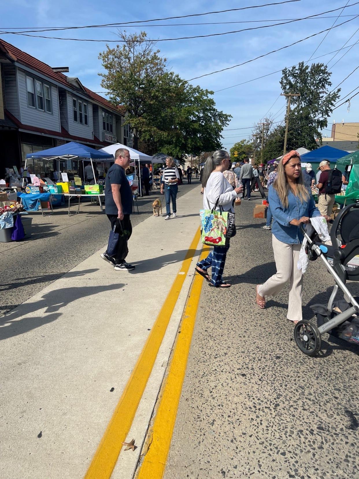 Attendees are shown at the Collingswood Book Festival in 2021 along Haddon Avenue.