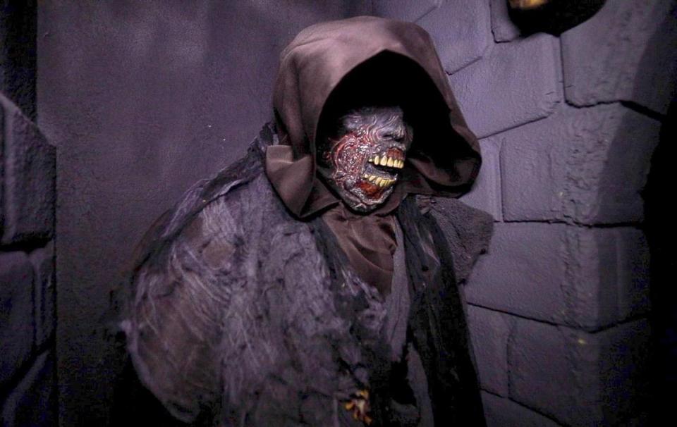 A scary puppet — or live person — greets visitors in the hallways of The Haunt in Atascadero on Oct. 13, 2023.