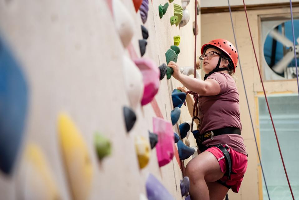 Victoria Atkinson, of Perkasie, climbs a rock wall at the Doylestown Rock Gym, in Doylestown Township, on Wednesday, July 20, 2022.