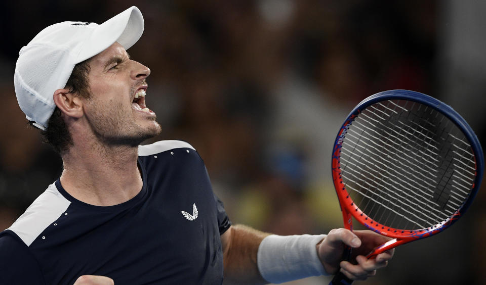 Britain's Andy Murray celebrates after winning the the third set tie-breaker against Spain's Roberto Bautista Agut during their first round match at the Australian Open tennis championships in Melbourne, Australia, Monday, Jan. 14, 2019. (AP Photo/Andy Brownbill)