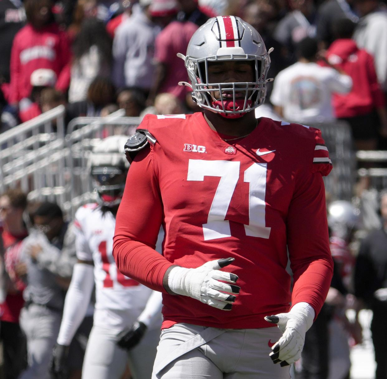 April 13, 2024; Columbus, Ohio, USA; 
Ohio State Buckeyes offensive tackle Josh Simmons (71) competes during the first half of the LifeSports spring football game at Ohio Stadium on Saturday.